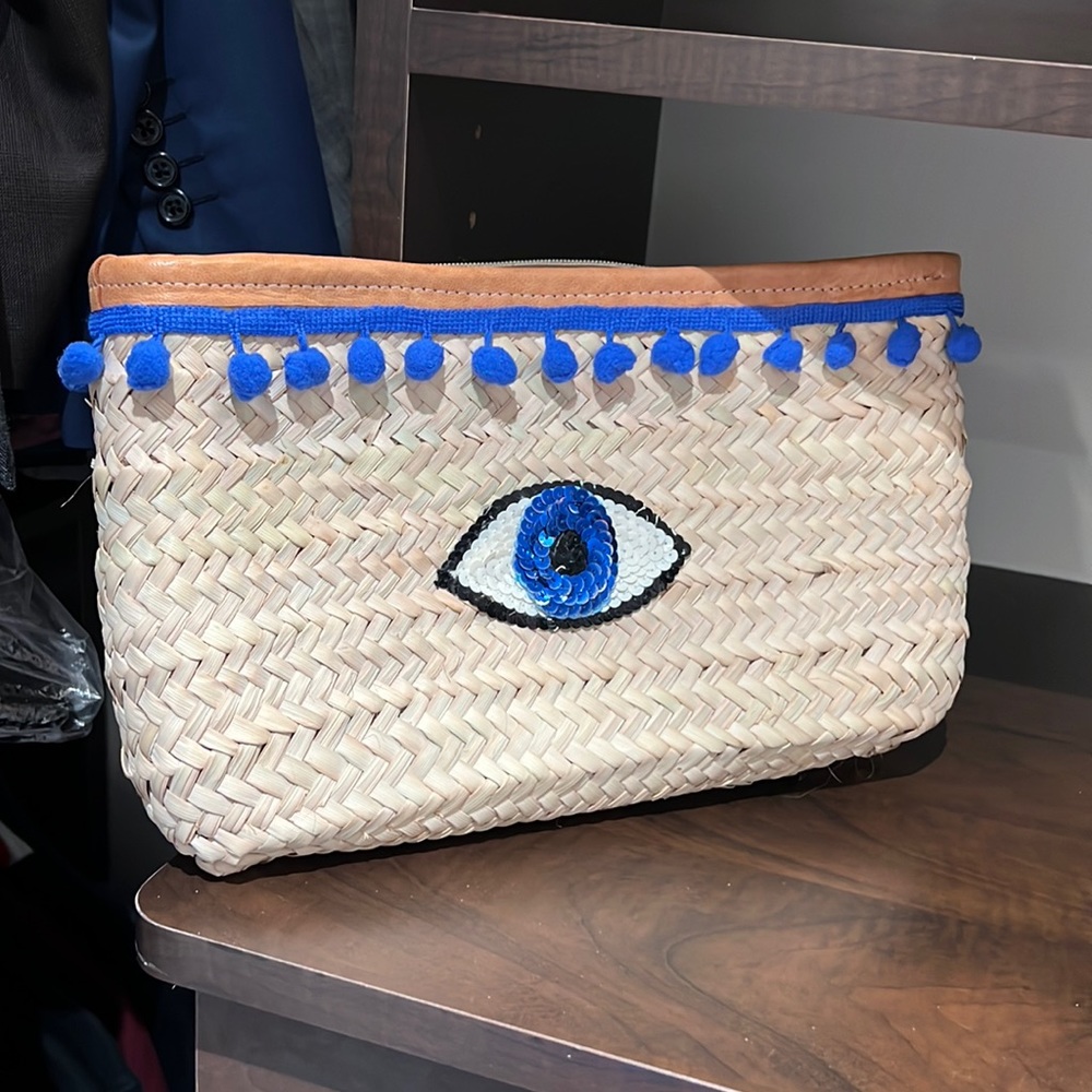 Woven clutch with sequin evil eye by Bits and Pieces To Go